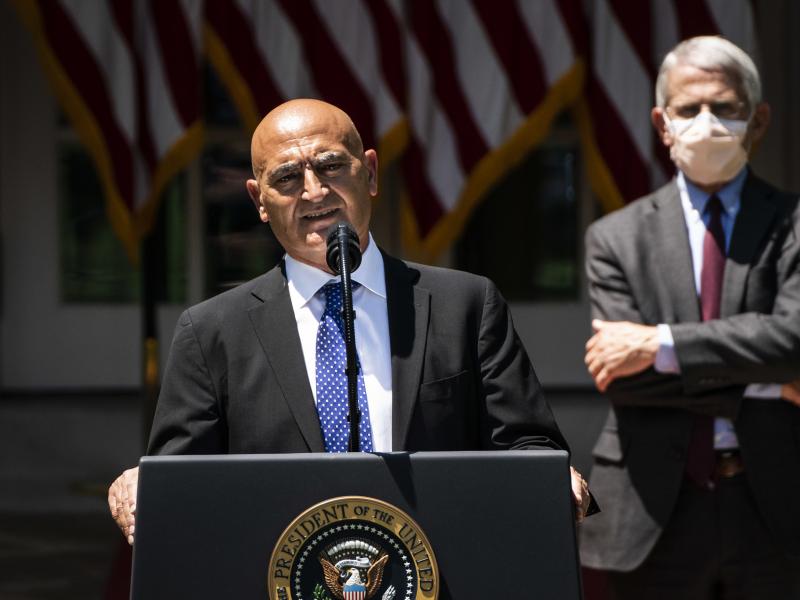Moncef Slaoui, a former GlaxoSmithKline executive, speaks during the kickoff announcement for Operation Warp Speed in the White House Rose Garden on May 15. Moncef Slaoui, a former GlaxoSmithKline executive, speaks during the kickoff announcement for Operation Warp Speed in the White House Rose Garden on May 15.