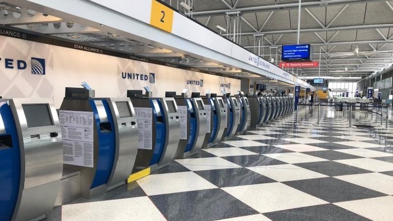 An empty terminal at Chicago's O'Hare International Airport. The normally bustling check-in at the United Airlines terminal was eerily quiet on April 24. An empty terminal at Chicago's O'Hare International Airport. The normally bustling check-in at the United Airlines terminal was eerily quiet on April 24.