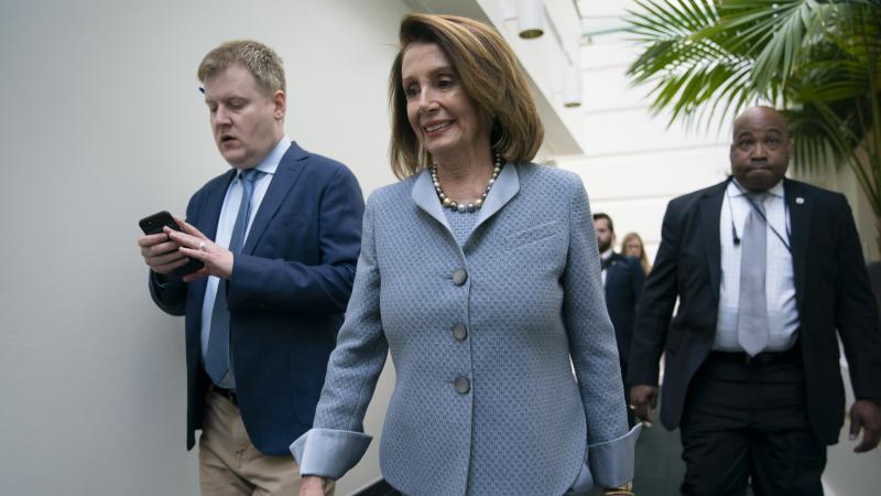 House Speaker Nancy Pelosi, D-Calif., walks to a Democratic Caucus meeting at the Capitol on Tuesday. She told lawmakers to "stay focused on our purpose for the people" with the end of the special counsel's Russia investigation. House Speaker Nancy Pelosi, D-Calif., walks to a Democratic Caucus meeting at the Capitol on Tuesday. She told lawmakers to "stay focused on our purpose for the people" with the end of the special counsel's Russia investigation.
