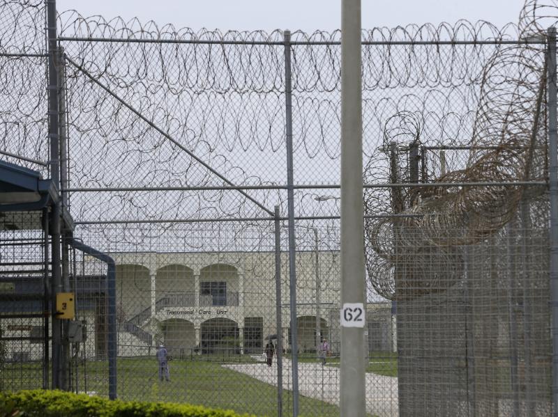 A prisoner works on the lawn at the Dade Correctional Institution In 2014, in Florida City, Fla. On Friday, Miami-Dade prosecutor Katherine Fernandez Rundle found no wrongdoing in the death of mentally ill prisoner Darren Rainey, who was locked in a showe A prisoner works on the lawn at the Dade Correctional Institution In 2014, in Florida City, Fla. On Friday, Miami-Dade prosecutor Katherine Fernandez Rundle found no wrongdoing in the death of mentally ill prisoner Darren Rainey, who was locked in a showe