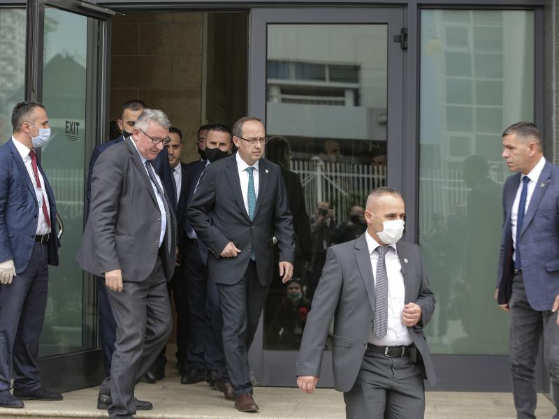 Newly elected prime minister Avdullah Hoti (center) walks out of the parliament building in the capital Pristina, on Wednesday. Newly elected prime minister Avdullah Hoti (center) walks out of the parliament building in the capital Pristina, on Wednesday.