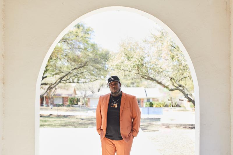 Thomas Mayfield poses at the entrance of J. T. Stevens Elementary School. Thomas Mayfield poses at the entrance of J. T. Stevens Elementary School.