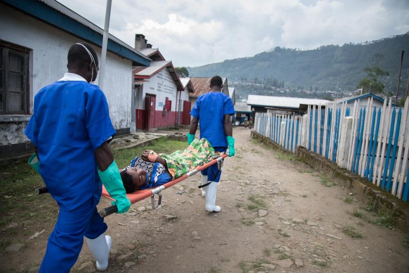 Medical workers transfer a patient from the Doctors Without Borders cholera treatment unit to the intensive care unit at the general hospital in Masisi, Democratic Republic of Congo. Medical workers transfer a patient from the Doctors Without Borders cholera treatment unit to the intensive care unit at the general hospital in Masisi, Democratic Republic of Congo.