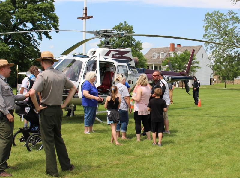 Visitors and park rangers at historic Fort Scott check out a medevac helicopter operated by Midwest AeroCare during the Kansas town's Good Ol' Days festival. Visitors and park rangers at historic Fort Scott check out a medevac helicopter operated by Midwest AeroCare during the Kansas town's Good Ol' Days festival.