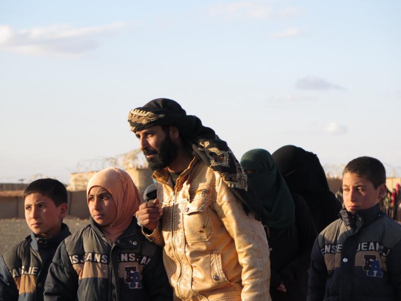 A tribal leader from the Rukban camp tries to get help for children from Raqaa who were separated from their parents, who were allowed into Jordan two years ago after their father became ill. A tribal leader from the Rukban camp tries to get help for children from Raqaa who were separated from their parents, who were allowed into Jordan two years ago after their father became ill.