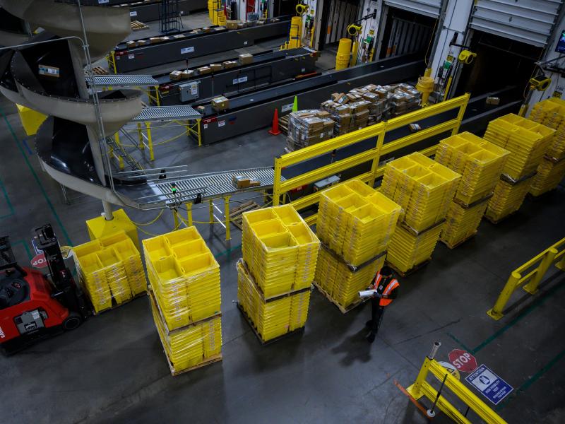 A man works at an Amazon fulfillment center in Staten Island, New York. The retail giant faces a major labor battle with a unionization vote planned at a similar warehouse in Alabama. A man works at an Amazon fulfillment center in Staten Island, New York. The retail giant faces a major labor battle with a unionization vote planned at a similar warehouse in Alabama.