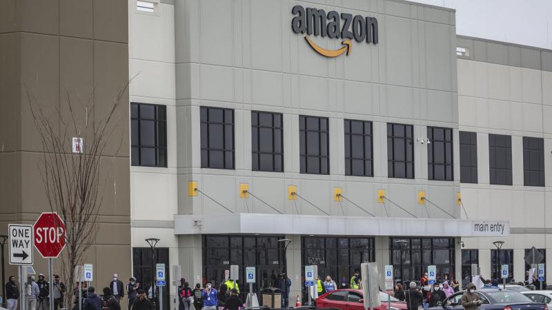 Workers at Amazon's fulfillment center in Staten Island, N.Y., gather outside to protest work conditions on March 30. More protests are being staged around the country this week. Workers at Amazon's fulfillment center in Staten Island, N.Y., gather outside to protest work conditions on March 30. More protests are being staged around the country this week.