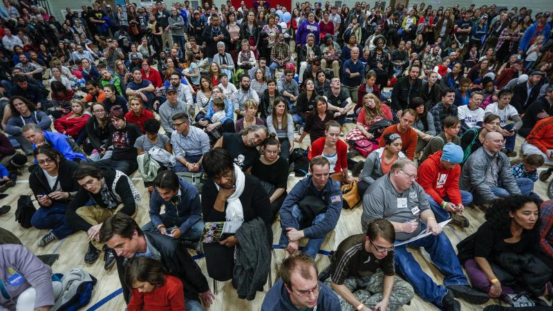Colorado Democrats pack a gym at a Denver high school during caucuses on March 1, 2016. The crowds and long lines have led to calls for the state to move to an open primary system. Colorado Democrats pack a gym at a Denver high school during caucuses on March 1, 2016. The crowds and long lines have led to calls for the state to move to an open primary system.