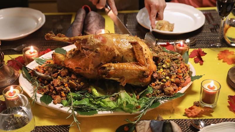 A Guatemalan immigrant carves the Thanksgiving turkey in November 2016 in Stamford, Conn. A Guatemalan immigrant carves the Thanksgiving turkey in November 2016 in Stamford, Conn.