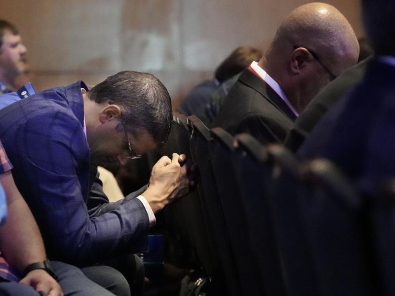 A man prays during the executive committee plenary meeting at the Southern Baptist Convention's annual gathering Monday in Nashville, Tenn. A man prays during the executive committee plenary meeting at the Southern Baptist Convention's annual gathering Monday in Nashville, Tenn.