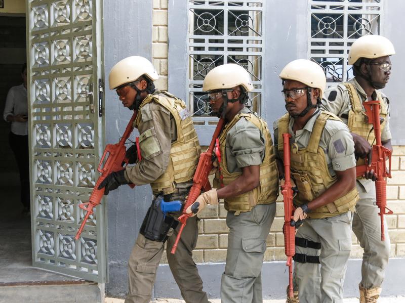 Helmeted Chadian and other African police commandos, armed with dummy rifles hunt down terrorist suspects who've taken hostages in the building, during a US military led Flintlock 2017 law enforcement exercise in Ndjamena Chad, 15 March 2017. Helmeted Chadian and other African police commandos, armed with dummy rifles hunt down terrorist suspects who've taken hostages in the building, during a US military led Flintlock 2017 law enforcement exercise in Ndjamena Chad, 15 March 2017.