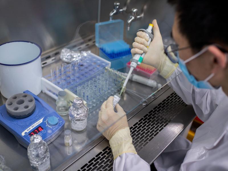 An engineer works in April on an experimental COVID-19 vaccine at Sinovac Biotech's facilities in Beijing. Sinovac Biotech is conducting one of four clinical trials that have been authorized in China. An engineer works in April on an experimental COVID-19 vaccine at Sinovac Biotech's facilities in Beijing. Sinovac Biotech is conducting one of four clinical trials that have been authorized in China.