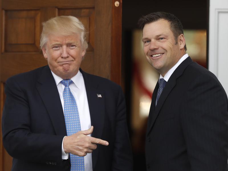 Kansas Secretary of State Kris Kobach with then-President-elect Donald Trump at the Trump National Golf Club in Bedminster, N.J., in November 2016. Kobach was tapped by Trump as vice chair of a commission on election integrity that's been beset with contr Kansas Secretary of State Kris Kobach with then-President-elect Donald Trump at the Trump National Golf Club in Bedminster, N.J., in November 2016. Kobach was tapped by Trump as vice chair of a commission on election integrity that's been beset with contr