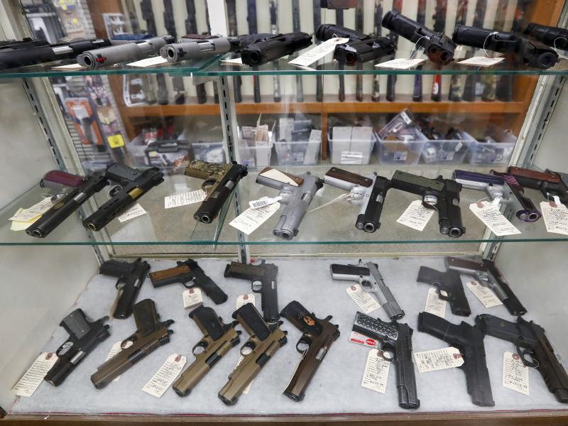 The FBI has reported a surge in background checks for gun sales. Here, firearms are for sale at a shop in New Castle, Pa. The FBI has reported a surge in background checks for gun sales. Here, firearms are for sale at a shop in New Castle, Pa.
