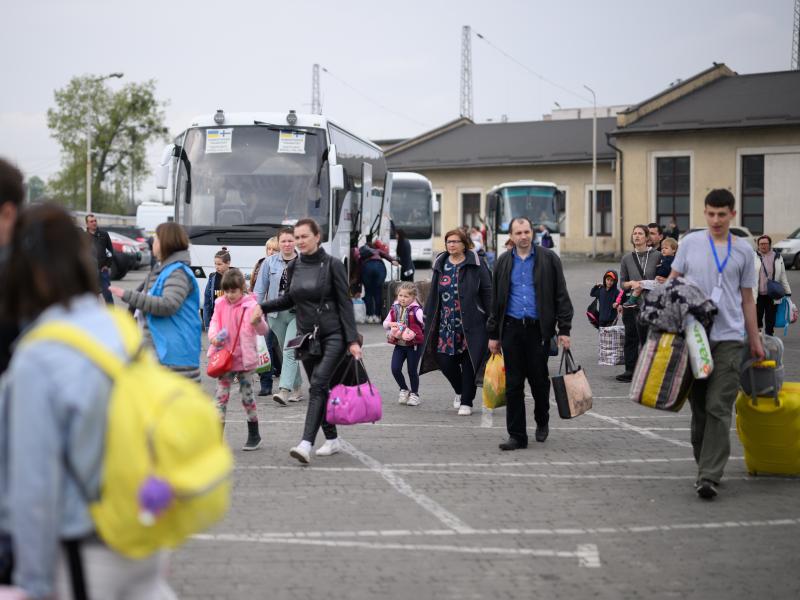 Refugees from war-torn regions of Ukraine board a coach to Warsaw at a coach station on Saturday in Lviv, Ukraine. A U.N. agency estimates that nearly 5 million jobs have been lost in Ukraine since Russia first invaded in late February. Refugees from war-torn regions of Ukraine board a coach to Warsaw at a coach station on Saturday in Lviv, Ukraine. A U.N. agency estimates that nearly 5 million jobs have been lost in Ukraine since Russia first invaded in late February.