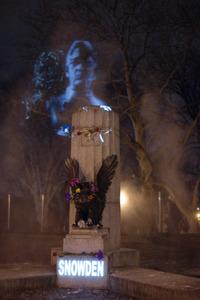 An art collective installed an Edward Snowden projection in a Brooklyn park Monday night, after a bust of Snowden was removed by authorities park earlier that day. An art collective installed an Edward Snowden projection in a Brooklyn park Monday night, after a bust of Snowden was removed by authorities park earlier that day.