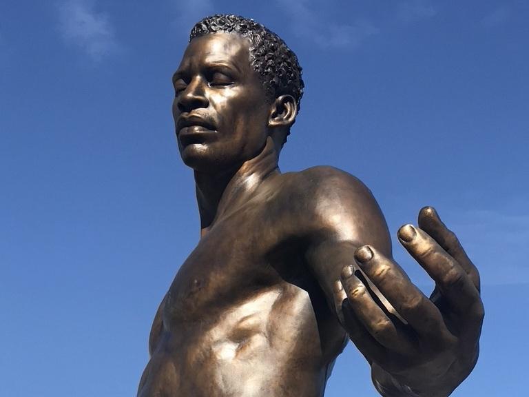 The new Emancipation and Freedom Monument in Richmond, Va., features two 12-foot bronze statues of a man and woman holding an infant who have been newly freed from slavery. The new Emancipation and Freedom Monument in Richmond, Va., features two 12-foot bronze statues of a man and woman holding an infant who have been newly freed from slavery.
