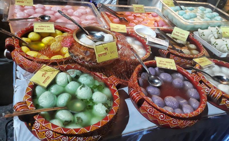 Rosogolla, also known as rasgulla, is a simple white spongy ball, made of chhena, an Indian version of cottage cheese, dunked in syrup. Above, newer, colorful iterations of this classic sweet are for sale during Rosogolla Day in Kolkata, India. Rosogolla, also known as rasgulla, is a simple white spongy ball, made of chhena, an Indian version of cottage cheese, dunked in syrup. Above, newer, colorful iterations of this classic sweet are for sale during Rosogolla Day in Kolkata, India.