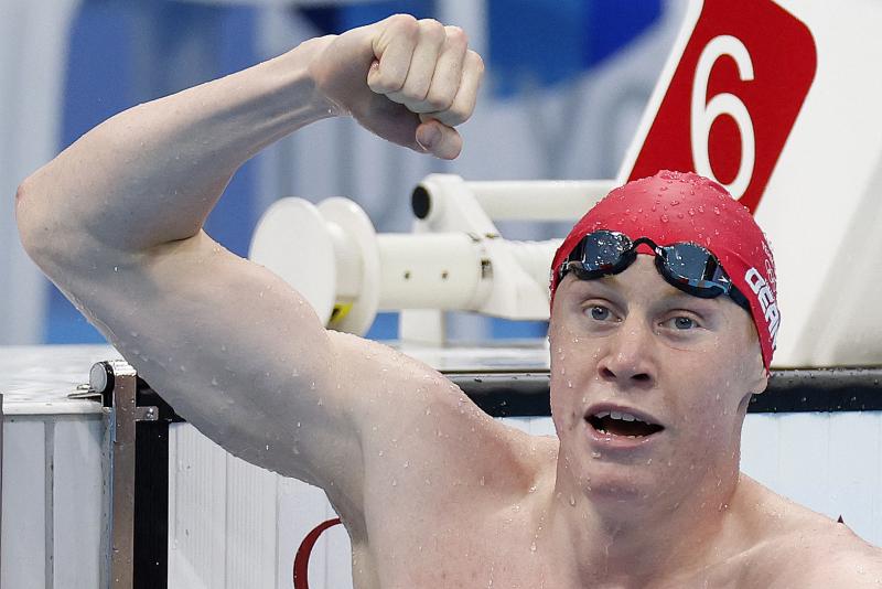 Britain's Tom Dean celebrates winning gold in the men's 200-meter freestyle swimming event at the Tokyo Olympics on Tuesday. Britain's Tom Dean celebrates winning gold in the men's 200-meter freestyle swimming event at the Tokyo Olympics on Tuesday.