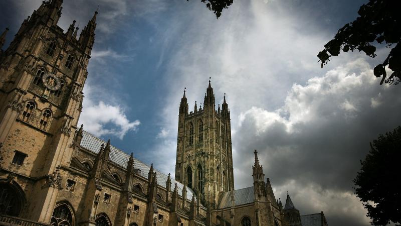 Canterbury Cathedral, the mother church of the international Anglican Communion, stands under clouds in 2008, in Canterbury, England. A church meeting this week on the issue of same-sex marriage has resulted in a three-year sanction of the Episcopal Churc Canterbury Cathedral, the mother church of the international Anglican Communion, stands under clouds in 2008, in Canterbury, England. A church meeting this week on the issue of same-sex marriage has resulted in a three-year sanction of the Episcopal Churc