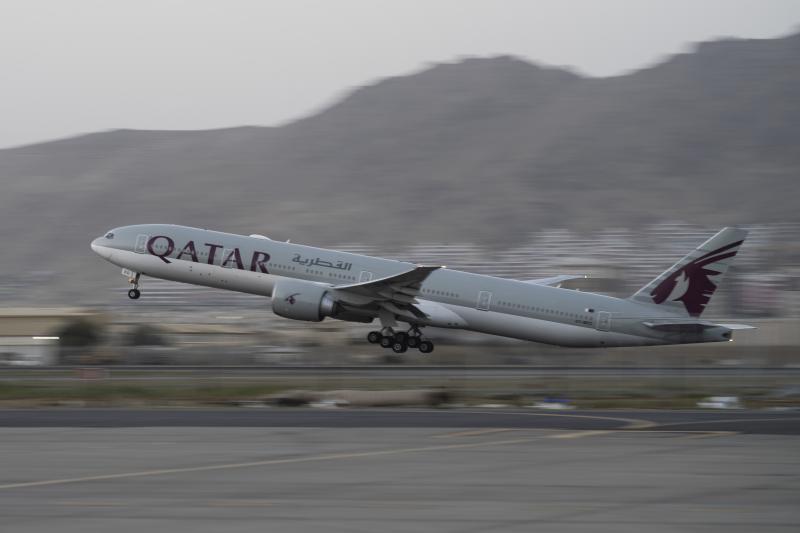 In this Sept. 9, 2021, photo, a Qatar Airways aircraft takes off with foreigners from the airport in Kabul, Afghanistan. In this Sept. 9, 2021, photo, a Qatar Airways aircraft takes off with foreigners from the airport in Kabul, Afghanistan.