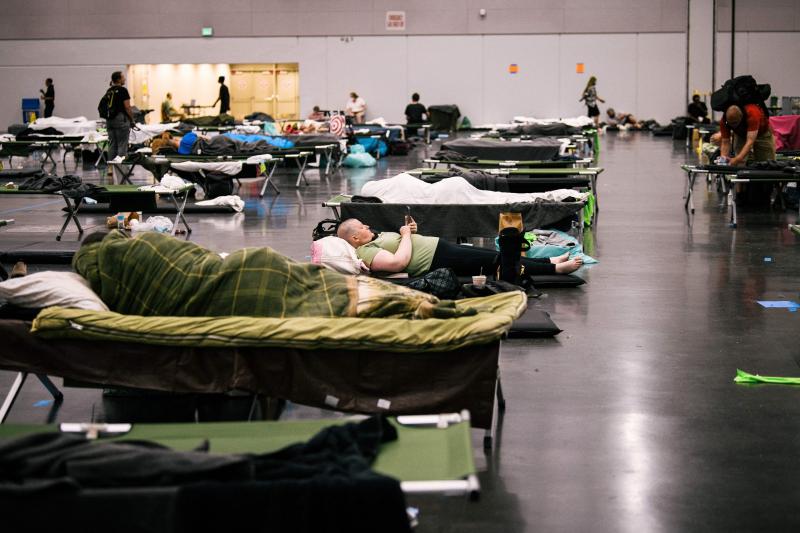 People rest at the Oregon Convention Center cooling station in Oregon, Portland on June 28, 2021, as a heatwave moves over much of the United States. People rest at the Oregon Convention Center cooling station in Oregon, Portland on June 28, 2021, as a heatwave moves over much of the United States.