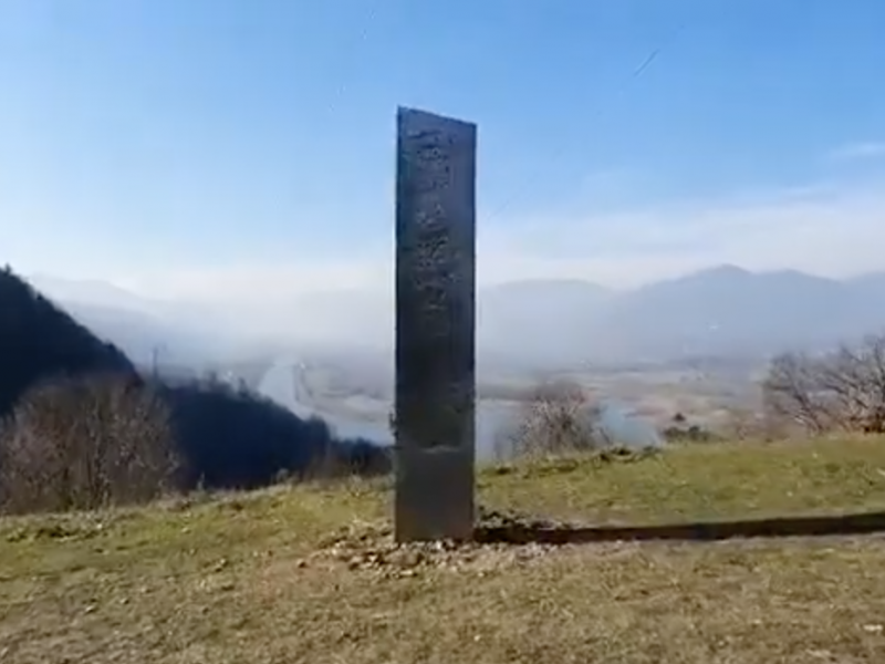 A metal monolith was reported to have appeared on a scenic location in northern Romania on Nov. 27. Local newspaper Ziar Piatra Neamt reported the finding on a hill near the archaeological site of an old fortress overlooking the Bâtca Doamnei lake. A metal monolith was reported to have appeared on a scenic location in northern Romania on Nov. 27. Local newspaper Ziar Piatra Neamt reported the finding on a hill near the archaeological site of an old fortress overlooking the Bâtca Doamnei lake.