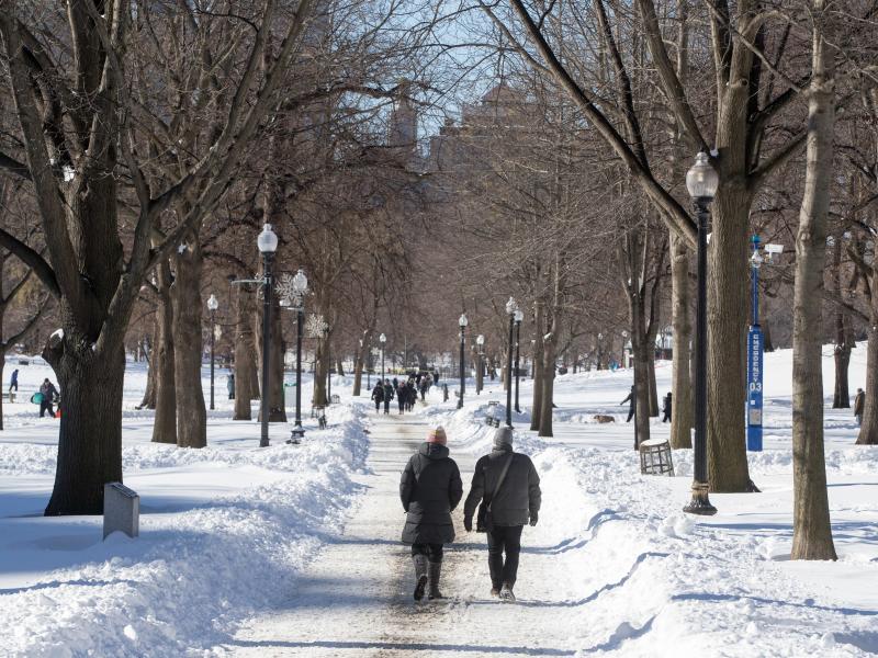 People walk on Boston Common in Boston after a snowstorm on Sunday. A powerful nor'easter last weekend brought blinding blizzard conditions with high winds causing widespread power outages to much of the Mid-Atlantic and New England coast. The storm dropp People walk on Boston Common in Boston after a snowstorm on Sunday. A powerful nor'easter last weekend brought blinding blizzard conditions with high winds causing widespread power outages to much of the Mid-Atlantic and New England coast. The storm dropp