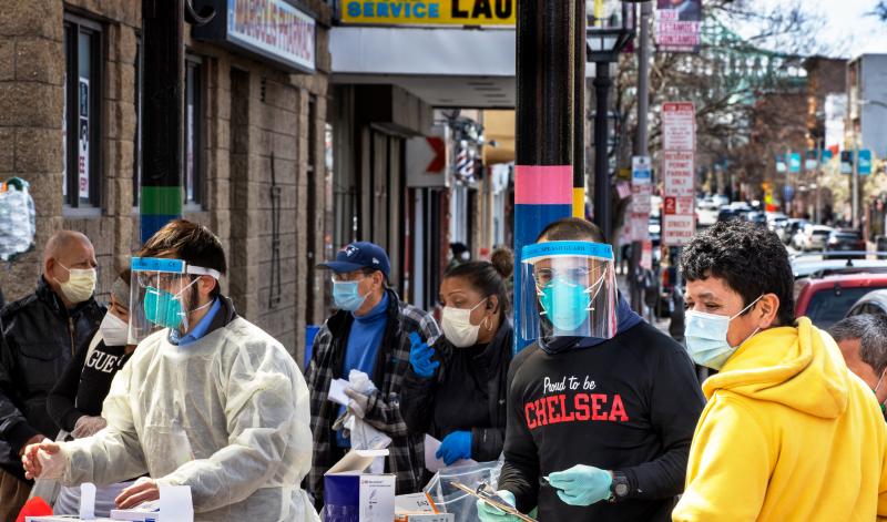 People line up in mid-April in Chelsea, Mass., to get antibody tests for the coronavirus that causes COVID-19. People line up in mid-April in Chelsea, Mass., to get antibody tests for the coronavirus that causes COVID-19.