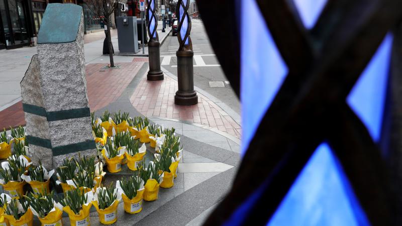 Flowers are placed at the memorial to the victims of the 2013 Boston Marathon bombings on April 20. Flowers are placed at the memorial to the victims of the 2013 Boston Marathon bombings on April 20.