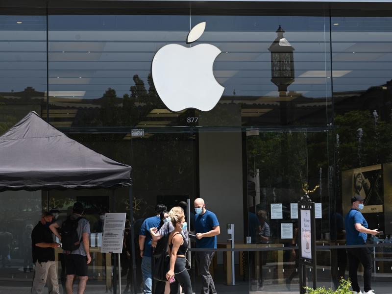 People enter an Apple Store at in Glendale, Calif., on June 23.The second-highest court in the European Union says Ireland's tax break for Apple did not represent an unfair advantage. People enter an Apple Store at in Glendale, Calif., on June 23.The second-highest court in the European Union says Ireland's tax break for Apple did not represent an unfair advantage.