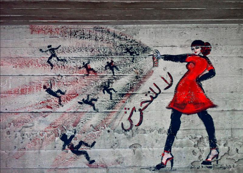 This graffiti in a neighborhood in Cairo is emblazoned with the words "no harassment" in Arabic. This graffiti in a neighborhood in Cairo is emblazoned with the words "no harassment" in Arabic.