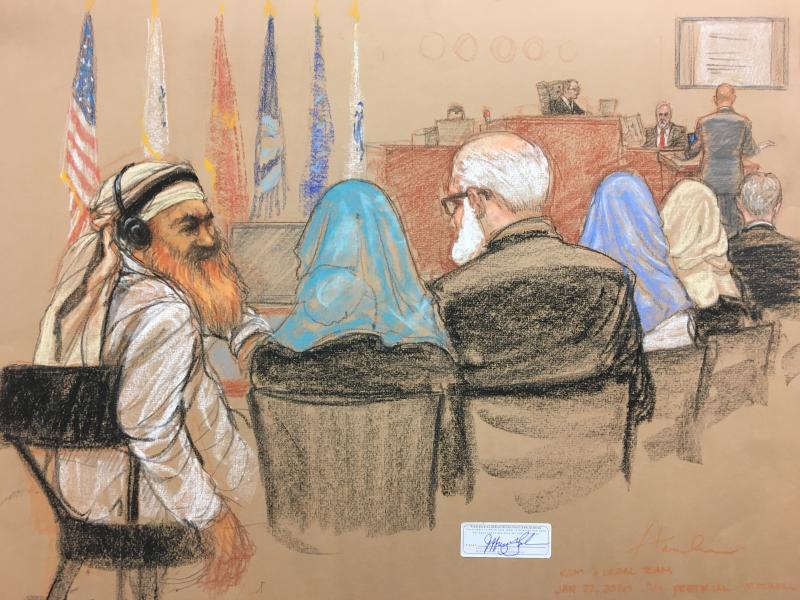 Alleged Sept. 11 mastermind Khalid Sheikh Mohammed (far left) consults with his defense attorneys in the U.S. military courtroom in Guantánamo Bay, Cuba, as a man who waterboarded him, retired Air Force psychologist James Mitchell, takes the stand. Alleged Sept. 11 mastermind Khalid Sheikh Mohammed (far left) consults with his defense attorneys in the U.S. military courtroom in Guantánamo Bay, Cuba, as a man who waterboarded him, retired Air Force psychologist James Mitchell, takes the stand.