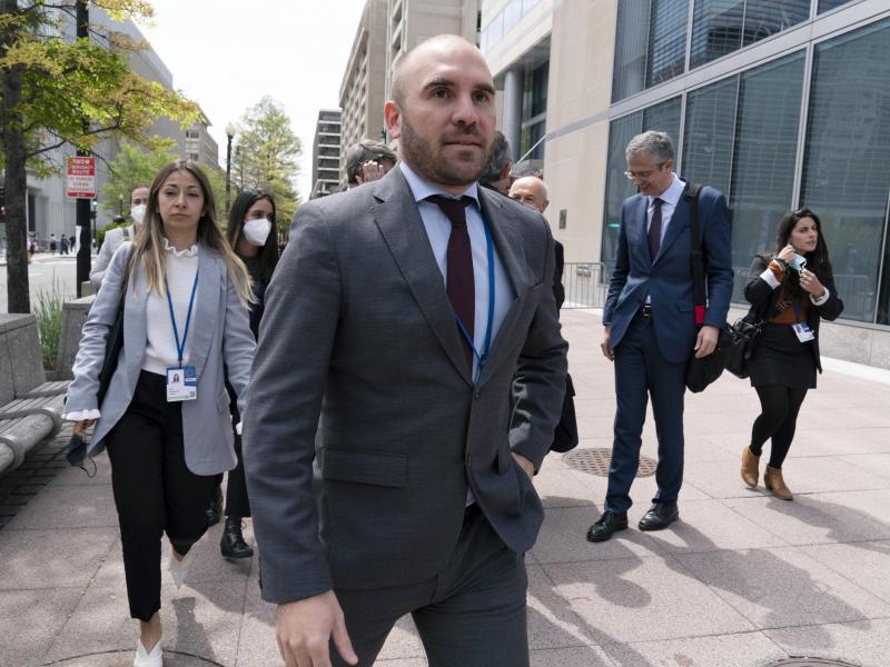 FILE - Argentina's Economy Minister Martin Guzman walks outside of the International Monetary Fund, IMF, building during the IMF Spring Meetings, in Washington, April 21, 2022. Guzman announced his resignation on Saturday, July 2, via twitter. FILE - Argentina's Economy Minister Martin Guzman walks outside of the International Monetary Fund, IMF, building during the IMF Spring Meetings, in Washington, April 21, 2022. Guzman announced his resignation on Saturday, July 2, via twitter.