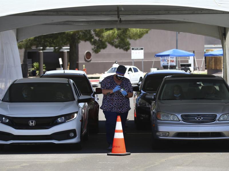 People get tested at a drive-through coronavirus testing site at South Mountain Community College on, July 9 in Phoenix. People get tested at a drive-through coronavirus testing site at South Mountain Community College on, July 9 in Phoenix.