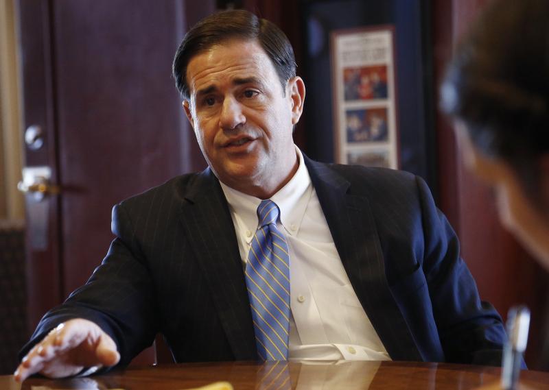 Republican Gov. Doug Ducey speaks about a variety of issues during an interview in his office at the Arizona Capitol in May 2018, in Phoenix. Republican Gov. Doug Ducey speaks about a variety of issues during an interview in his office at the Arizona Capitol in May 2018, in Phoenix.
