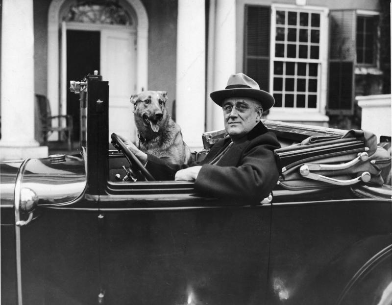 Portrait of American President Franklin Delano Roosevelt (1882 - 1945) sitting behind the wheel of his car outside his home in Hyde Park, New York in the mid 1930s. Portrait of American President Franklin Delano Roosevelt (1882 - 1945) sitting behind the wheel of his car outside his home in Hyde Park, New York in the mid 1930s.