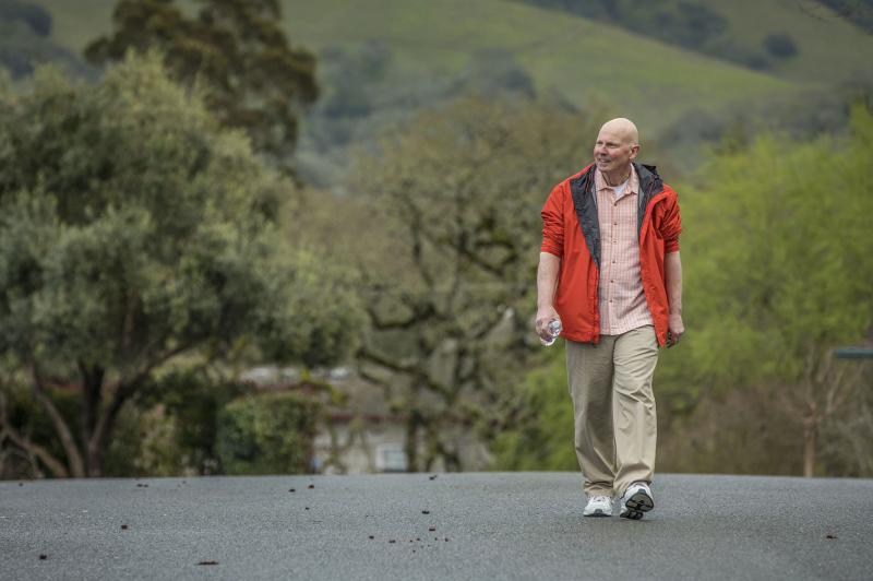 Cancer patient John Krahne has delayed taking a prescribed cancer drug because it was too expensive. He walks near his home in Santa Rosa, Calif. Cancer patient John Krahne has delayed taking a prescribed cancer drug because it was too expensive. He walks near his home in Santa Rosa, Calif.