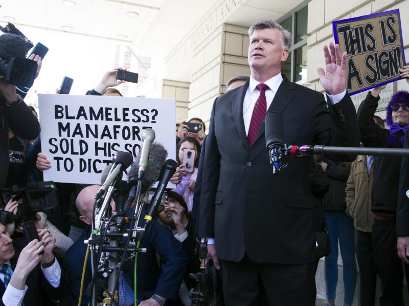 Kevin Downing, Paul Manafort's attorney, leaves federal court after Manafort's sentencing hearing in Washington on Wednesday. Kevin Downing, Paul Manafort's attorney, leaves federal court after Manafort's sentencing hearing in Washington on Wednesday.
