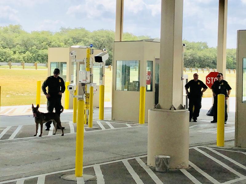 Border Patrol agents with a sniffer dog at the new and expanded Falfurrias checkpoint. Border Patrol agents with a sniffer dog at the new and expanded Falfurrias checkpoint.