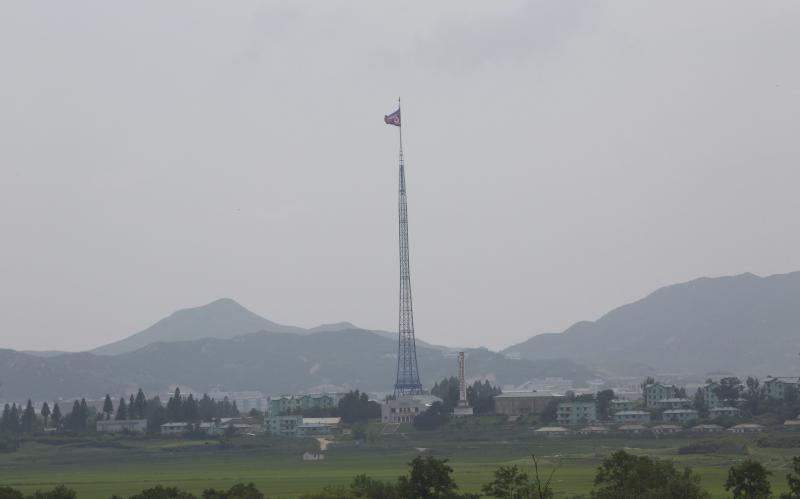 A giant North Korean flag flutters from a 528-foot pole near the border with South Korea. Tunnels built by North Korea's military are believed to extend across the border. A giant North Korean flag flutters from a 528-foot pole near the border with South Korea. Tunnels built by North Korea's military are believed to extend across the border.