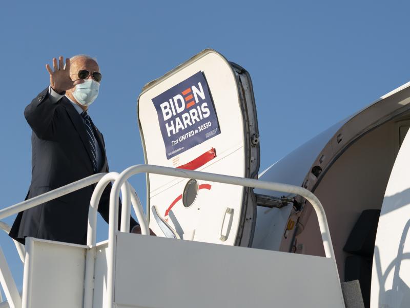 Democratic presidential nominee Joe Biden boards his campaign plane. Democratic presidential nominee Joe Biden boards his campaign plane.