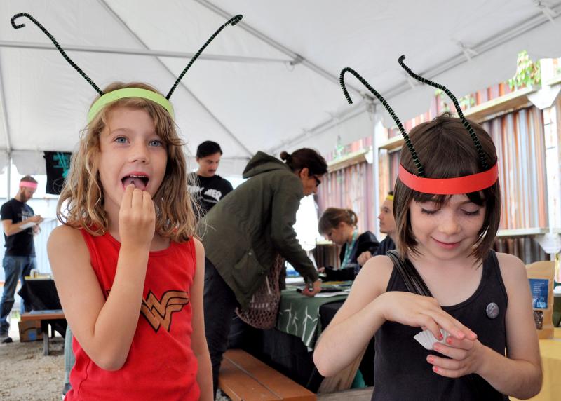 Tennesee Nydegger-Sandidge (left) and Holly Hook try chowing down on some crickets. "People should eat them because they're good for the planet," says Tennessee. Tennesee Nydegger-Sandidge (left) and Holly Hook try chowing down on some crickets. "People should eat them because they're good for the planet," says Tennessee.