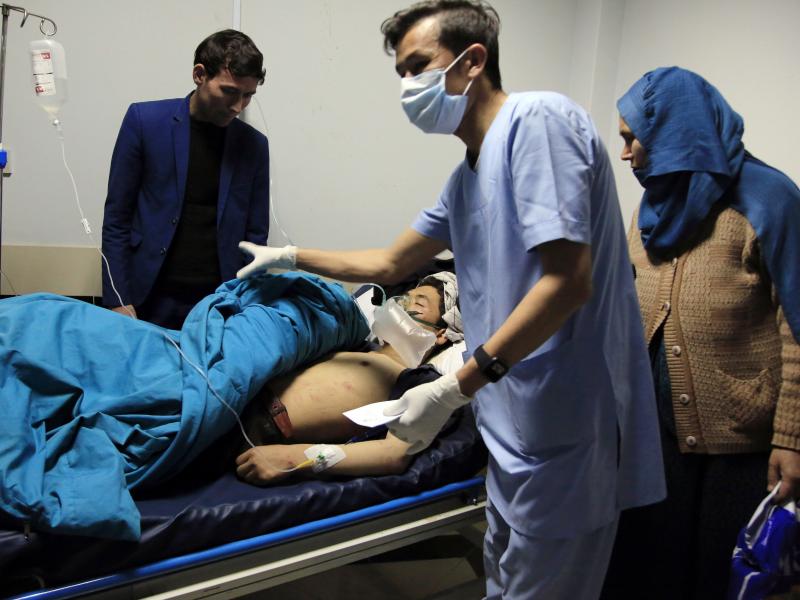 Patients are treated at a hospital after a suicide attack in Kabul, Afghanistan, on Saturday. Dozens were injured. Patients are treated at a hospital after a suicide attack in Kabul, Afghanistan, on Saturday. Dozens were injured.