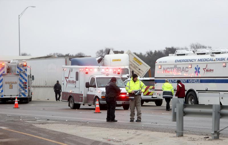 First responders arrive at the scene of a massive pileup of vehicles on Interstate 35W near downtown Fort Worth, Texas, on Thursday. First responders arrive at the scene of a massive pileup of vehicles on Interstate 35W near downtown Fort Worth, Texas, on Thursday.