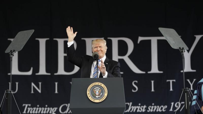 President Donald Trump gives the commencement address for the Class of 2017 at Liberty University in Lynchburg, Va., Saturday. President Donald Trump gives the commencement address for the Class of 2017 at Liberty University in Lynchburg, Va., Saturday.