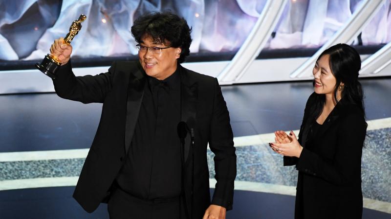 Bong Joon-ho, here with interpreter Sharon Choi, won big at Sunday's Oscars. His film Parasite took best international feature and best picture, and he was recognized for his direction and writing. Bong Joon-ho, here with interpreter Sharon Choi, won big at Sunday's Oscars. His film Parasite took best international feature and best picture, and he was recognized for his direction and writing.