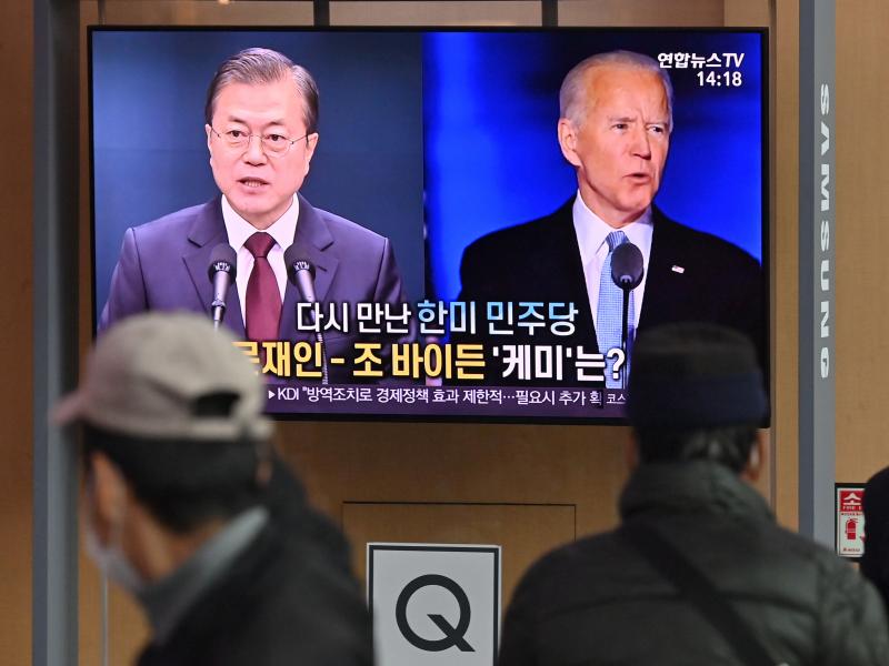 People in Seoul watch a news report in November on the U.S. election, showing images of Joe Biden, newly elected as president, and South Korean President Moon Jae-in. People in Seoul watch a news report in November on the U.S. election, showing images of Joe Biden, newly elected as president, and South Korean President Moon Jae-in.