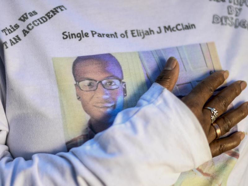 Sheneen McClain stands at the site where her son Elijah was killed after an interaction with Aurora Police officers and paramedics resulted in the 23-year-old being restrained, choked and given a sedative on Aug. 24, 2019. Elijah McClain died less than a Sheneen McClain stands at the site where her son Elijah was killed after an interaction with Aurora Police officers and paramedics resulted in the 23-year-old being restrained, choked and given a sedative on Aug. 24, 2019. Elijah McClain died less than a