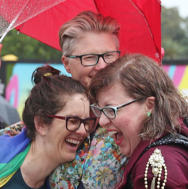 A group of women in Federation Square in Melbourne react on Thursday as it is announced that same-sex marriage will be legal in Australia. A group of women in Federation Square in Melbourne react on Thursday as it is announced that same-sex marriage will be legal in Australia.